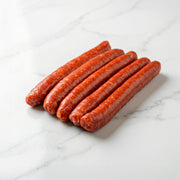 Merguez artisanales crues de bœuf et d'agneau préparées en atelier par La Boucherie s.a.