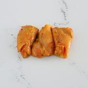 Hauts de cuisse de poulet marinés à l'Indienne | Votre boucherie en ligne | La Boucherie s.a.
